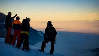 Winter team experience Snowshoe tour high above Lake Walen